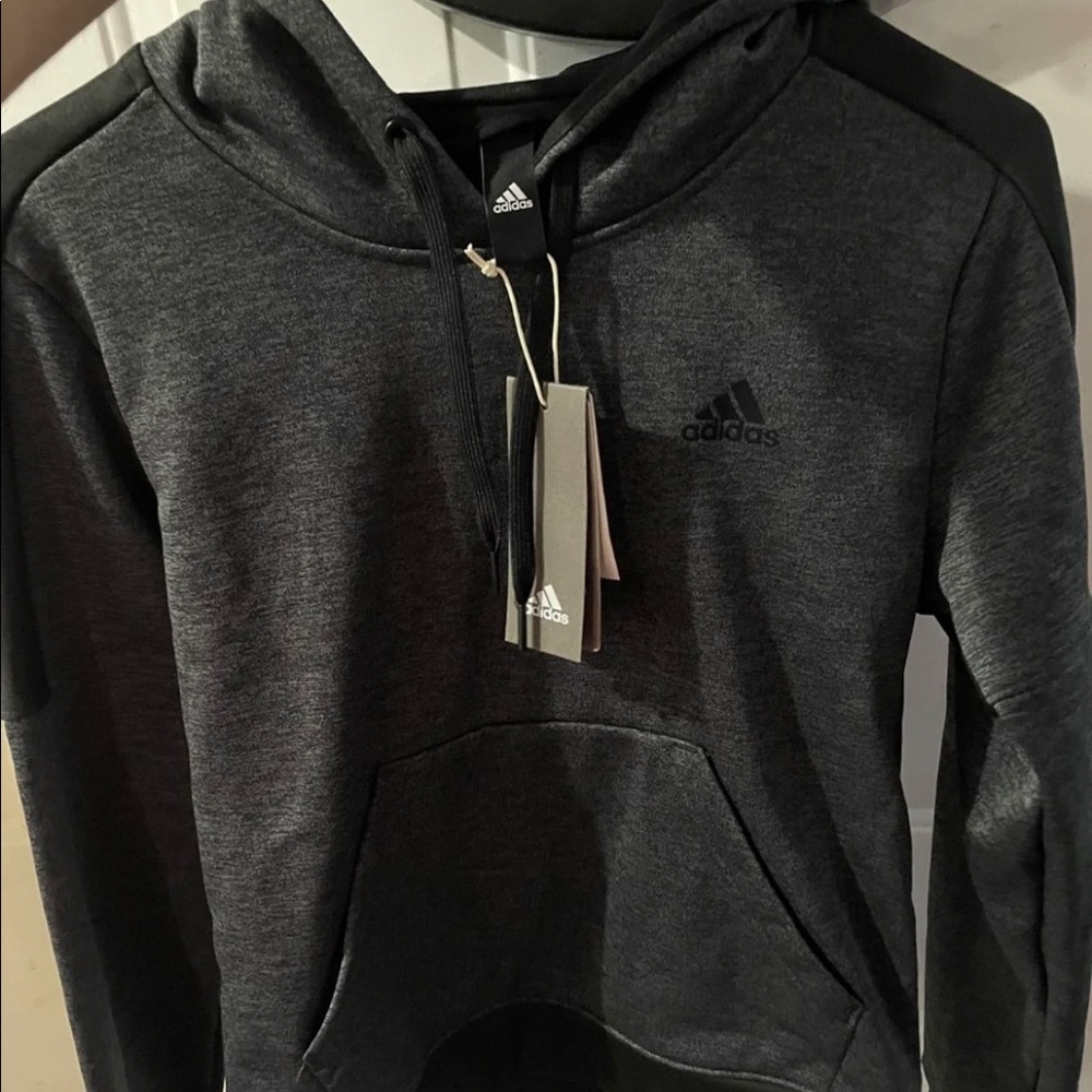 Adidas womens fleece
pullover sweater size small
NWT